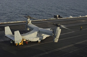 An MV-22 Osprey receives cargo on the flight deck of USS Harry S. Truman An MV-22 Osprey receives cargo on the flight deck of USS Harry S. Truman