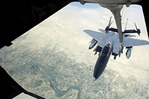 n F-15E Strike Eagle receives fuel from a KC-10 Extender n F-15E Strike Eagle receives fuel from a KC-10 Extender