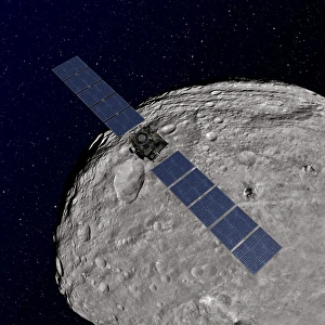 NASAs Dawn spacecraft orbiting the giant asteroid Vesta NASAs Dawn spacecraft orbiting the giant asteroid Vesta