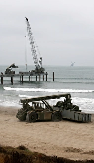 Navy Seabees dismantling an Elevated Causeway Modular Navy Seabees dismantling an Elevated Causeway Modular