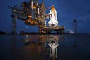 Night view of space shuttle Atlantis on the launch pad at Kennedy Space Center, Florida Night view of space shuttle Atlantis on the launch pad at Kennedy Space Center, Florida