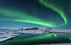 Images Dated 20th March 2013: The northern lights dance over the glacier lagoon in Iceland