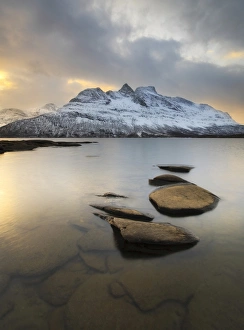 Novatinden Mountain and Skoddeberg Lake in Troms County, Norway Novatinden Mountain and Skoddeberg Lake in Troms County, Norway