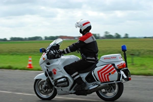 An officer of the Military Police of Belgium on his BMW R 1150 RT motorcycle An officer of the Military Police of Belgium on his BMW R 1150 RT motorcycle