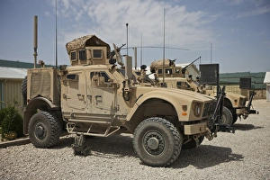 An Oshkosh M-ATV parked at a military base in Afghanistan An Oshkosh M-ATV parked at a military base in Afghanistan