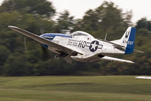 A P-51 Mustang takes off from Waukegan, Illinois A P-51 Mustang takes off from Waukegan, Illinois
