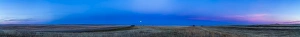 Panoramic view of the Harvest Moon rising after sunset, Alberta, Canada Panoramic view of the Harvest Moon rising after sunset, Alberta, Canada