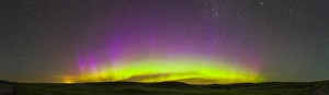 Panoramic view of northern lights on the horizon, Saskatchewan, Canada Panoramic view of northern lights on the horizon, Saskatchewan, Canada
