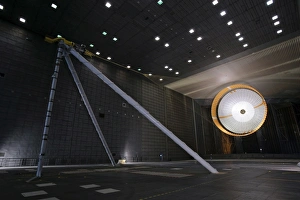 A parachute undergoes flight-qualification testing inside a wind tunnel A parachute undergoes flight-qualification testing inside a wind tunnel
