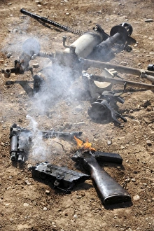 Pieces of enemy weapons lay out to cool off after being de-militarized Pieces of enemy weapons lay out to cool off after being de-militarized