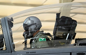 Pilot makes final pre-flight checks on an F-15E Strike Eagle Pilot makes final pre-flight checks on an F-15E Strike Eagle