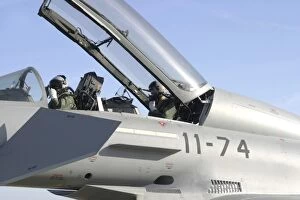 Images Dated 21st April 2005: Pilots perform preflight checks in the cockpit of a Eurofighter Typhoon