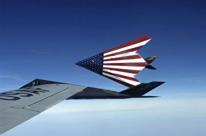 Pilots refuel a pair of F-117 Stealth Fighters Pilots refuel a pair of F-117 Stealth Fighters