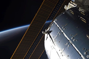 A portion of the International Space Stations Columbus laboratory and solar array panels A portion of the International Space Stations Columbus laboratory and solar array panels