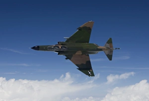 A QF-4E aircraft flies over the Gulf of Mexico A QF-4E aircraft flies over the Gulf of Mexico
