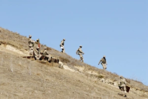 Recruits descend one of many hills to track down a far-away checkpoint Recruits descend one of many hills to track down a far-away checkpoint