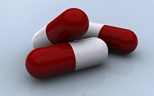 <b class=qtipBold><figcaption>Red and yellow medication capsules</figcaption></b><br>Red and yellow medication capsules on colored background.<br><em>© Stocktrek Images</em> Red and yellow medication capsules