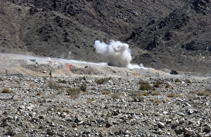 A round from an AT-4 small rocket launcher impacts on Range 400 A round from an AT-4 small rocket launcher impacts on Range 400