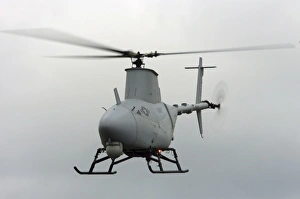 A RQ-8A Fire Scout unmanned aerial vehicle in flight A RQ-8A Fire Scout unmanned aerial vehicle in flight