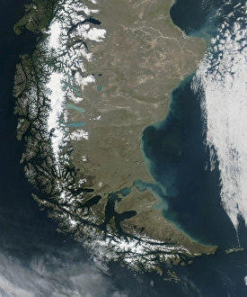 The rugged, snow-capped Andes dominate the left side of this image of Southern Chile The rugged, snow-capped Andes dominate the left side of this image of Southern Chile