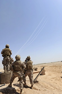 Seabees watch rockets fire overhead Seabees watch rockets fire overhead