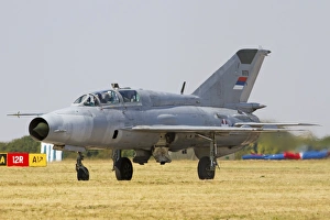 A Serbian Air Force MiG-21UM taxiing at Batajnica Air Base A Serbian Air Force MiG-21UM taxiing at Batajnica Air Base