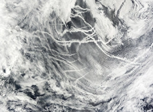 <b class=qtipBold><figcaption>Ship tracks in the Pacific Ocean</figcaption></b><br>July 13, 2008 - Though they may look like airplane contrails, the streaky clouds shown in this image are ship tracks, bright clouds that form in a shipas wake. The clouds run horizontally across the image, tracing out a major shipping lane in the North Pacific Ocean. Ship tracks occur when clouds form around the tiny particles that ships release in their exhaust.<br><em>© Stocktrek Images</em> Ship tracks in the Pacific Ocean