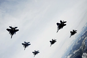 A six-ship formation of aircraft fly over the Sawtooth Mountains in Idaho A six-ship formation of aircraft fly over the Sawtooth Mountains in Idaho