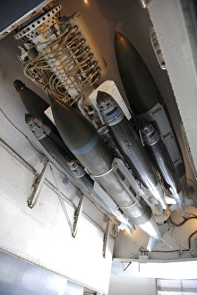 Smart munitions on an ejector rack of a B-1B Lancer Smart munitions on an ejector rack of a B-1B Lancer