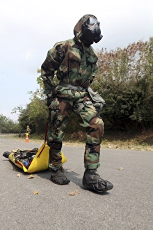 Soldier drags a simulated attack victim during a training exercise Soldier drags a simulated attack victim during a training exercise