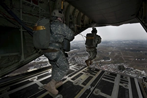 Soldiers jump from a C-130 aircraft over Germany Soldiers jump from a C-130 aircraft over Germany