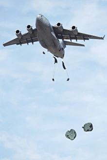 Soldiers jump from a C-17 Globemaster III during a Mobility Air Forces Exercise Soldiers jump from a C-17 Globemaster III during a Mobility Air Forces Exercise