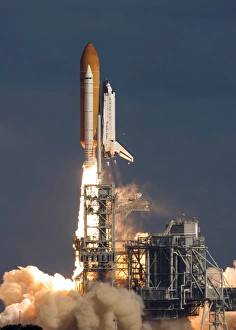 Space Shuttle Atlantis clears the tower at the Kennedy Space Center, Florida Space Shuttle Atlantis clears the tower at the Kennedy Space Center, Florida