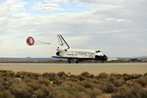 Space Shuttle Discovery deploys its drag chute as the vehicle comes to a stop Space Shuttle Discovery deploys its drag chute as the vehicle comes to a stop