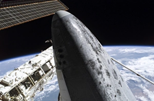 Space Shuttle Discovery docked to the International Space Station Space Shuttle Discovery docked to the International Space Station