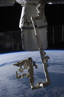 The SpaceX Dragon commercial cargo craft berthed to the ISS The SpaceX Dragon commercial cargo craft berthed to the ISS