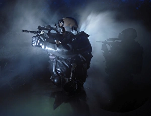 Special operation forces combat divers armed with Steyr AUG assault rifles Special operation forces combat divers armed with Steyr AUG assault rifles
