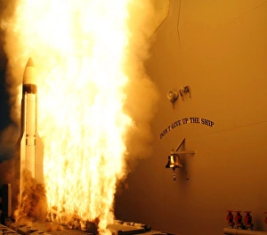 A Standard Missile 3 leaves the guided missile cruiser USS Lake Erie A Standard Missile 3 leaves the guided missile cruiser USS Lake Erie