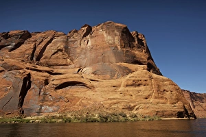 Steep cliffs guard the Colorado River near Lees Ferry, Arizona Steep cliffs guard the Colorado River near Lees Ferry, Arizona