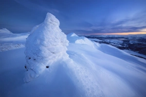 Sunset on the summit Toviktinden Mountain, Norway Sunset on the summit Toviktinden Mountain, Norway