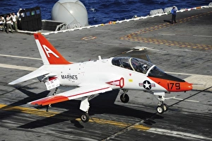 A T-45C Goshawk lands on the flight deck of USS Theodore Roosevelt A T-45C Goshawk lands on the flight deck of USS Theodore Roosevelt
