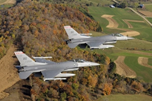 A two-ship formation of F-16 Fighting Falcons on a routine training mission A two-ship formation of F-16 Fighting Falcons on a routine training mission