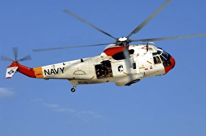 A UH-3H Sea King helicopter flies a search and rescue training mission A UH-3H Sea King helicopter flies a search and rescue training mission