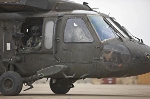 A UH-60 Black Hawk taxis out for a mission over northern Iraq A UH-60 Black Hawk taxis out for a mission over northern Iraq