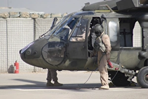 A UH-60 Blackhawk Medivac helicopter refuels at Camp Warhorse after a mission A UH-60 Blackhawk Medivac helicopter refuels at Camp Warhorse after a mission