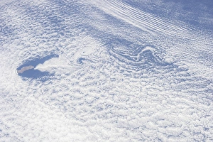 Unusual cloud patterns surrounding Guadalupe Island in the Pacific Ocean Unusual cloud patterns surrounding Guadalupe Island in the Pacific Ocean