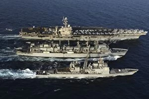 Images Dated 16th February 2013: USNS Bridge conducts a replenishment at sea with USS John C. Stennis and USS Mobile Bay