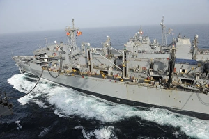 USNS Rainier transits alongside USS Nimitz during a replenishment at sea USNS Rainier transits alongside USS Nimitz during a replenishment at sea
