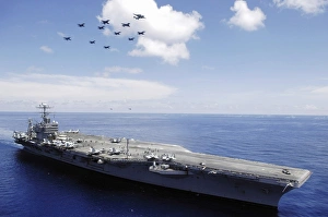 USS Abraham Lincoln and aircraft perform a aerial demonstration USS Abraham Lincoln and aircraft perform a aerial demonstration