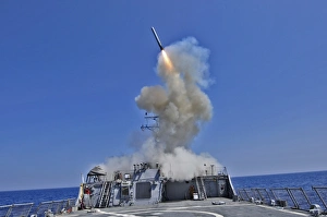 USS Barry launches a Tomahawk cruise missile USS Barry launches a Tomahawk cruise missile